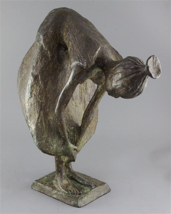 20th century Continental School. A bronze figure of a woman bending over, height 20.5in.